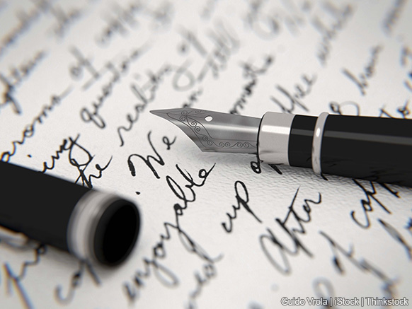 A photo shows a fountain pen and letter written in cursive