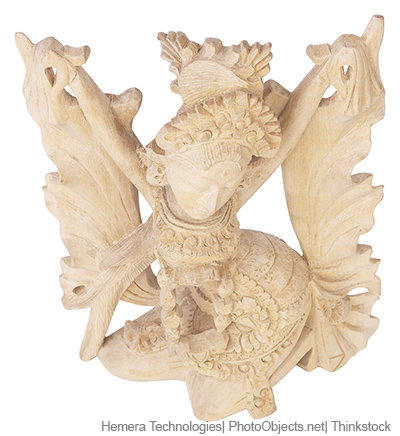 A photo shows an ornate carving made of ivory