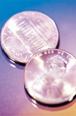 A photo shows two pennies.